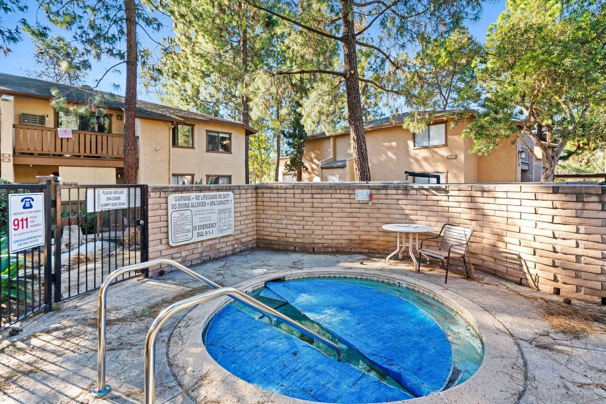 10226 Black Mountain Road, Unit 83 San Diego, CA 92126 - Photo 23 of 23 a view of a house with backyard