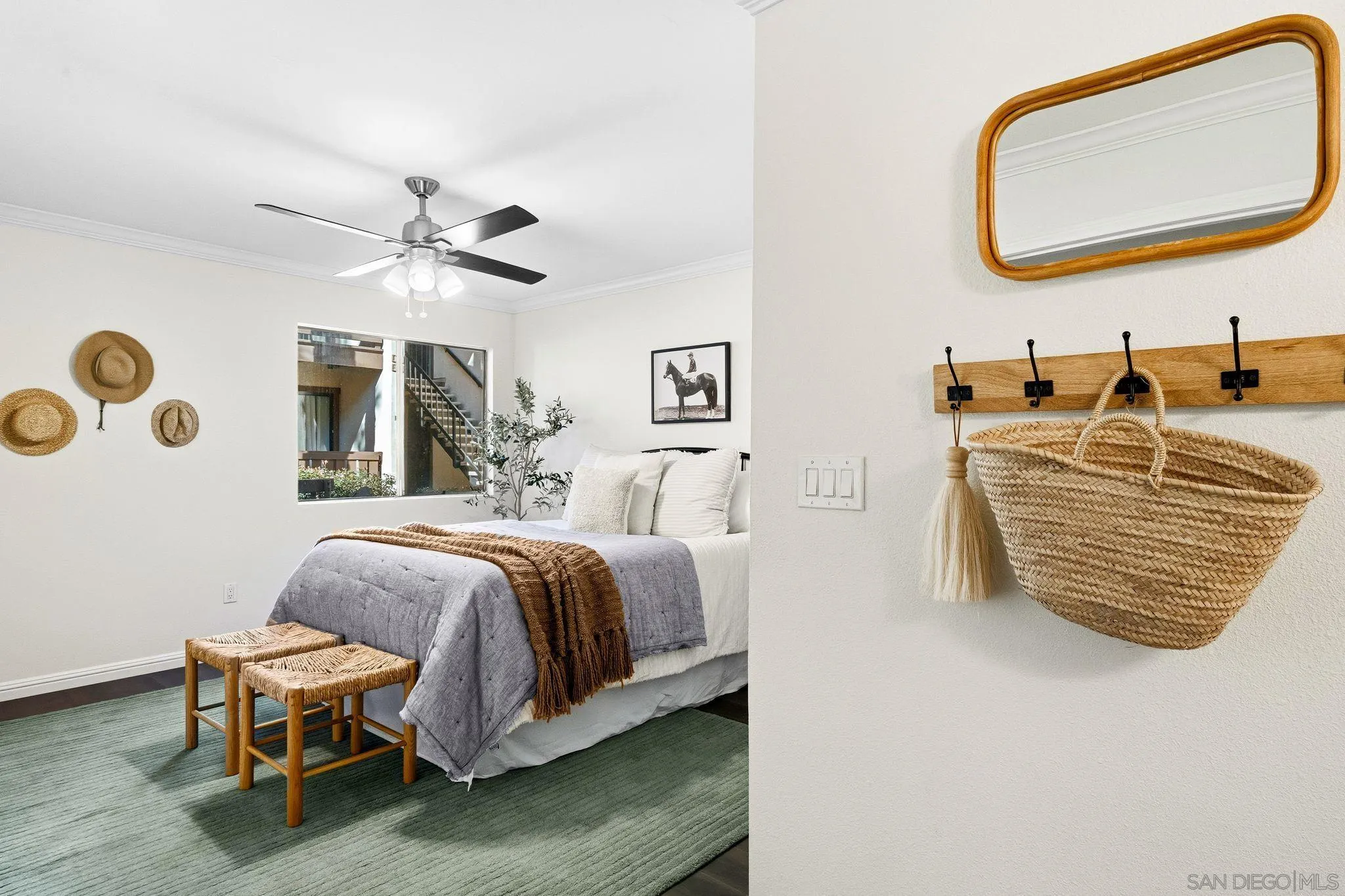 10226 Black Mountain Road, Unit 83 San Diego, CA 92126 - Photo 9 of 23 a spacious bedroom with a bed a mirror and a table