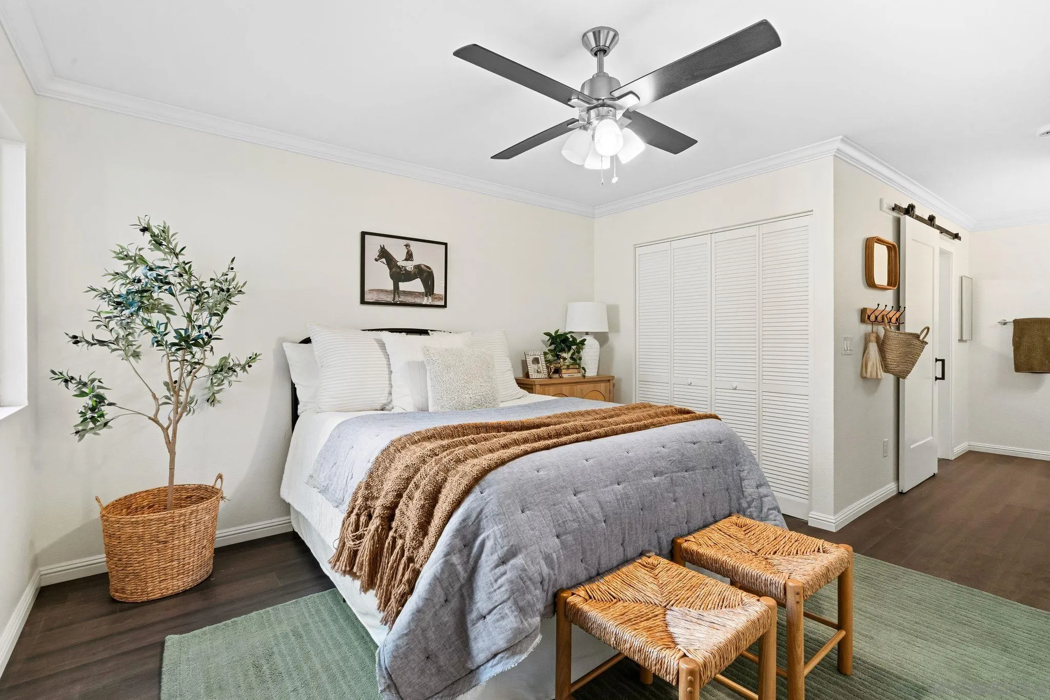 10226 Black Mountain Road, Unit 83 San Diego, CA 92126 - Photo 10 of 23 a bedroom with a bed and a chair