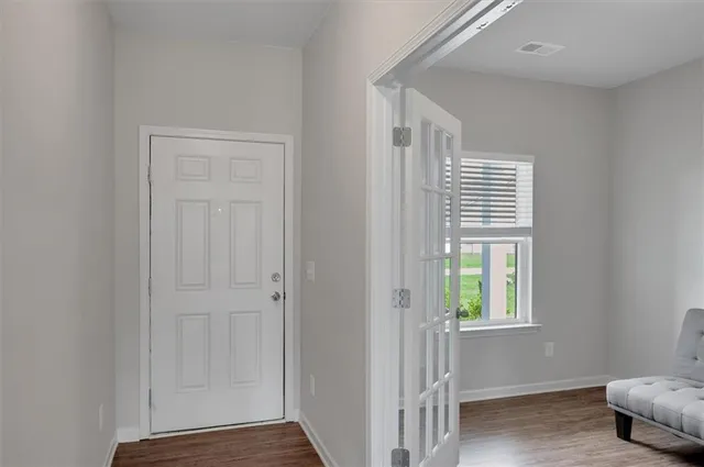 a view of livingroom with furniture and window