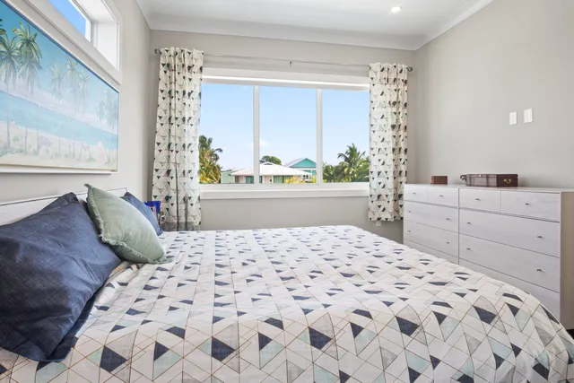 a bathroom with a sink a toilet and a shower