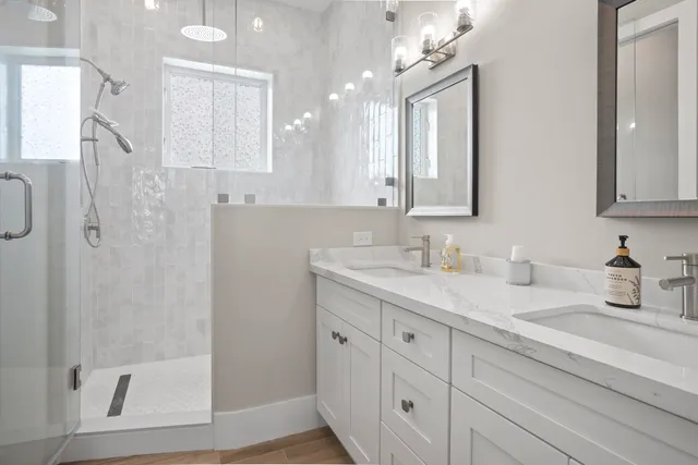 a aerial view of a house with a yard and sitting area