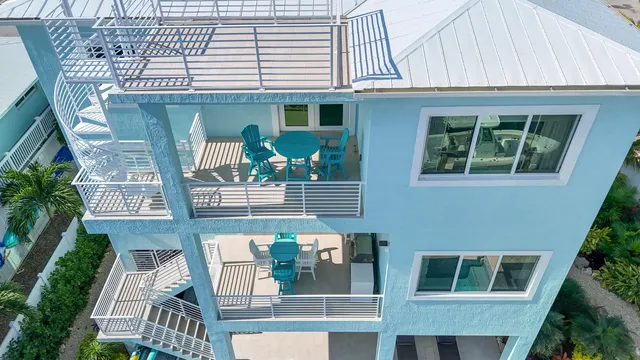 a view of a swimming pool with an outdoor seating and a garden
