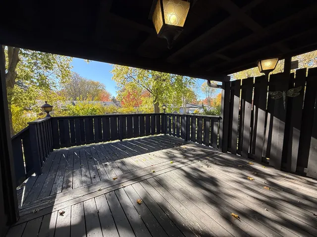 a view of outdoor space with wooden fence