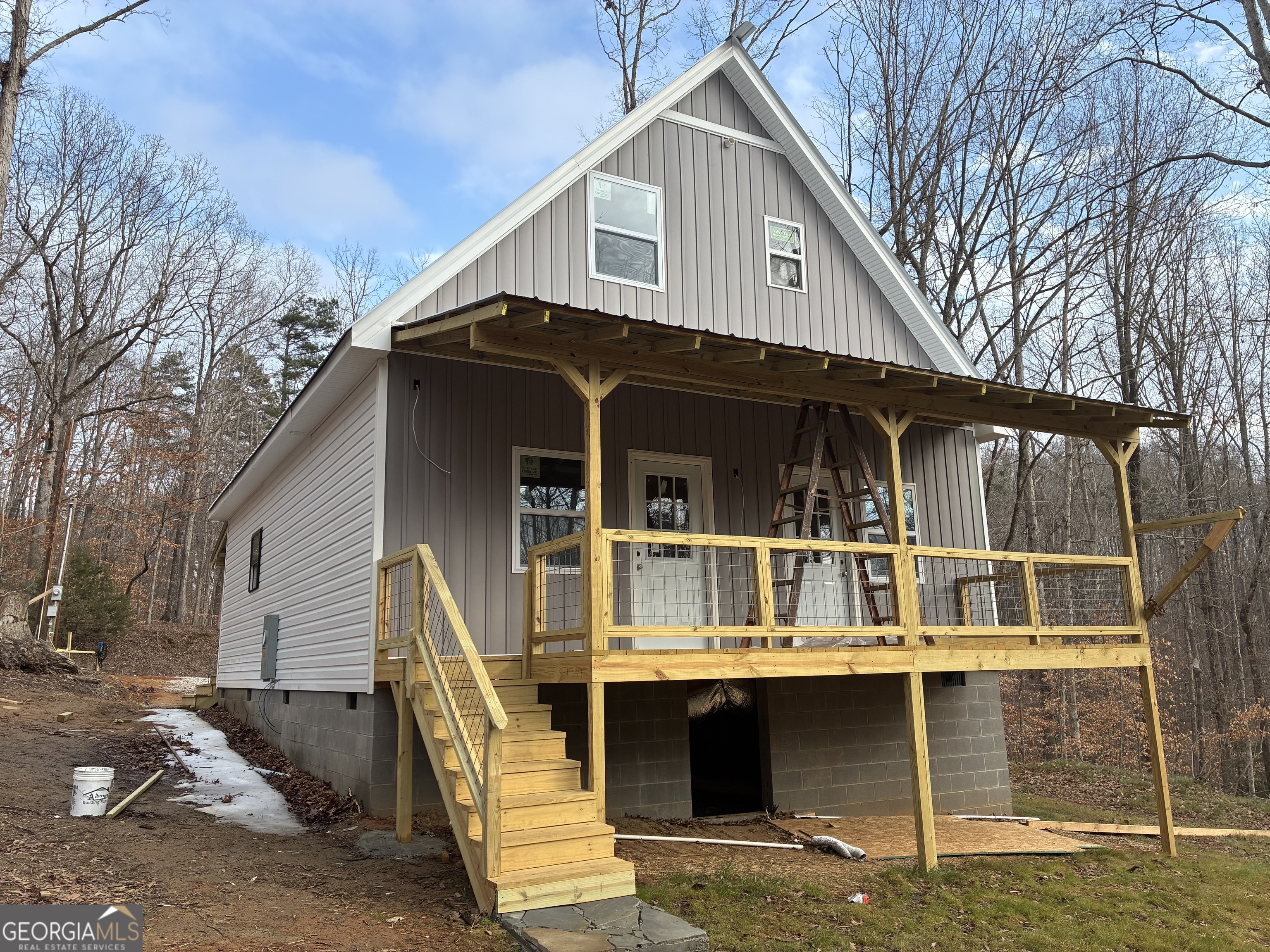 312 Hillshore Road Lavonia, GA 30553 - Photo 3 of 11 a front view of a house with a balcony