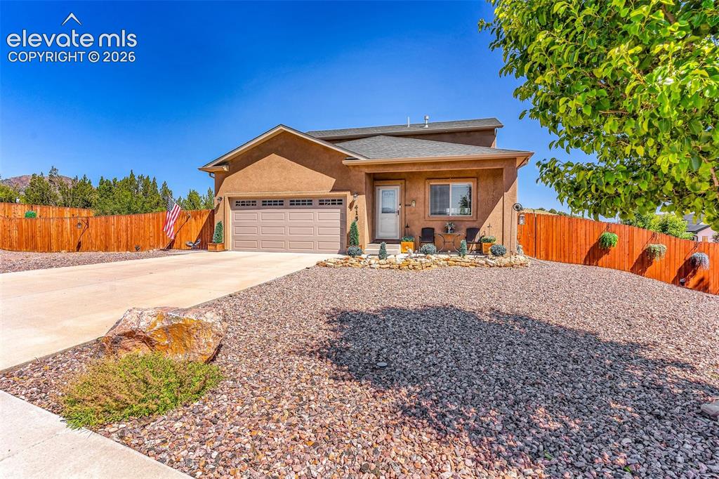 415 Empire Road Canon City, CO 81212 - Photo 4 of 40 a view of swimming pool with an outdoor seating