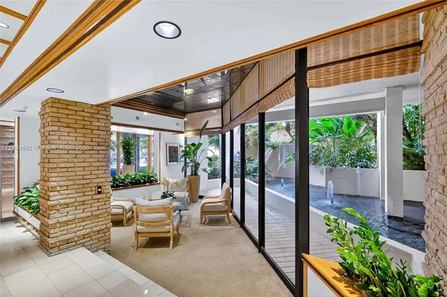 a view of sitting area with lake view