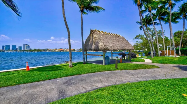 a view of a bench in front of house