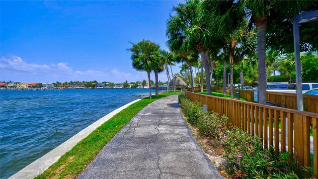 a view of a lake with tall buildings