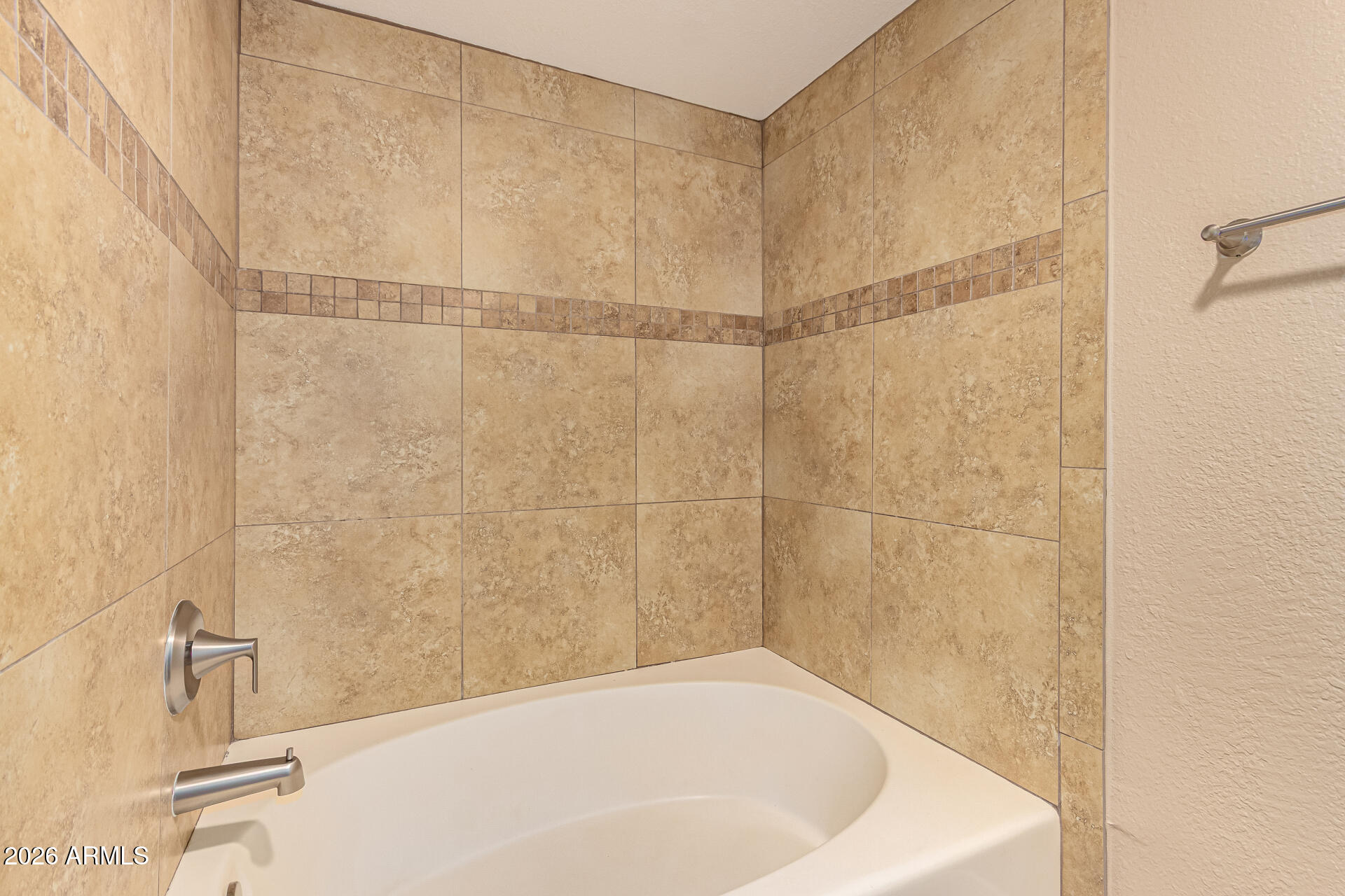 1340 North Recker Road, Unit 343 Mesa, AZ 85205 - Photo 17 of 28 a bathroom with a bathtub