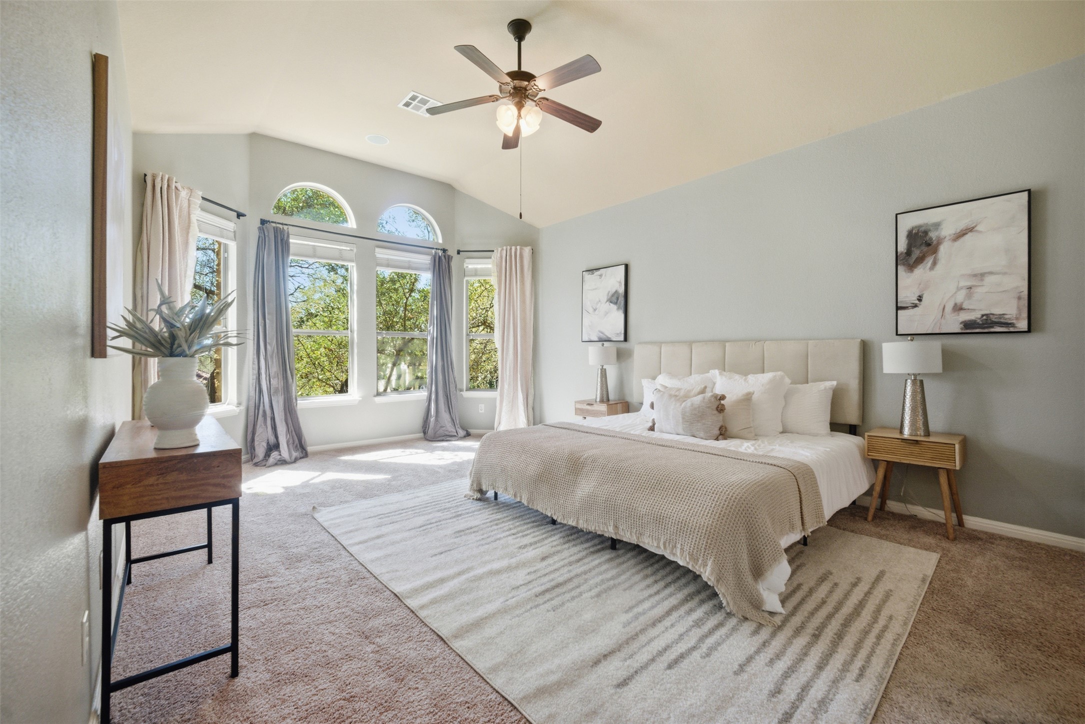 16100 Spillman Ranch Loop Austin, TX 78738 - Photo 23 of 39 Bedroom with carpet, vaulted ceiling, and a ceiling fan