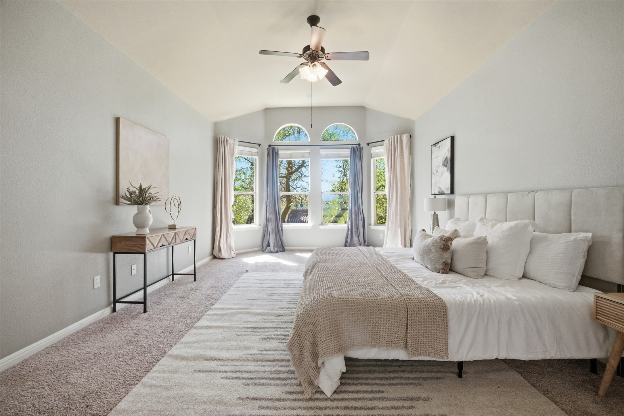 16100 Spillman Ranch Loop Austin, TX 78738 - Photo 24 of 39 Carpeted bedroom featuring lofted ceiling and ceiling fan