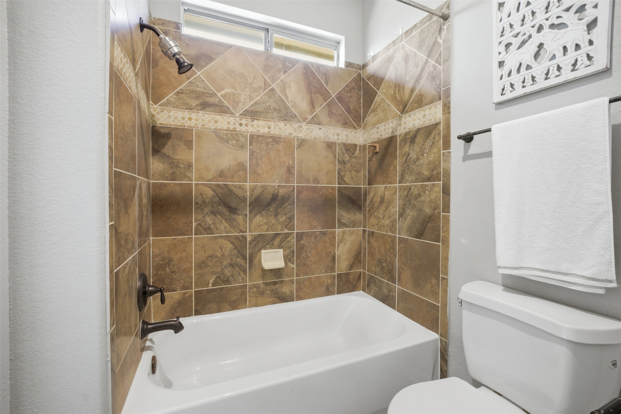 16100 Spillman Ranch Loop Austin, TX 78738 - Photo 33 of 39 Bathroom with toilet and tub / shower combination