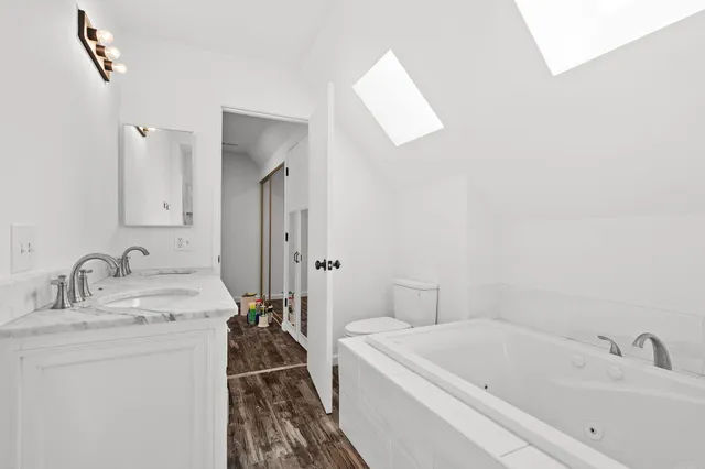 a bathroom with a sink and a bathtub