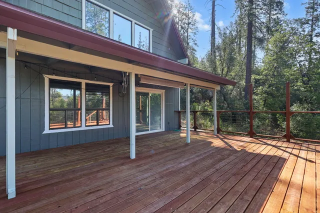 a porch with seating space and yard