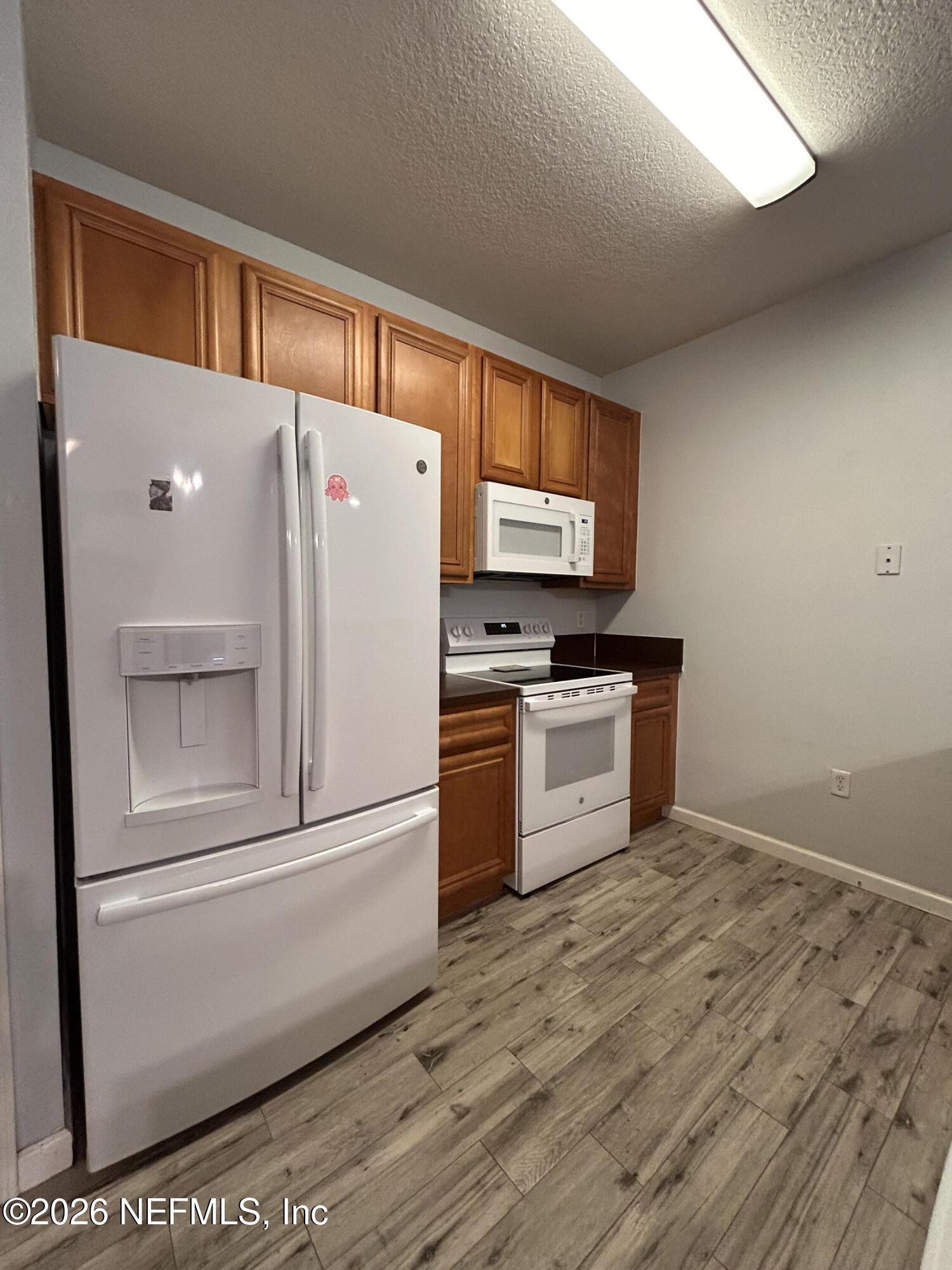 8215 Green Parrot Road, Unit 103 Jacksonville, FL 32256 - Photo 6 of 28 IMG_6983