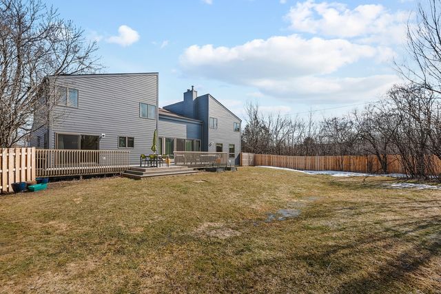 a view of swimming pool with a yard