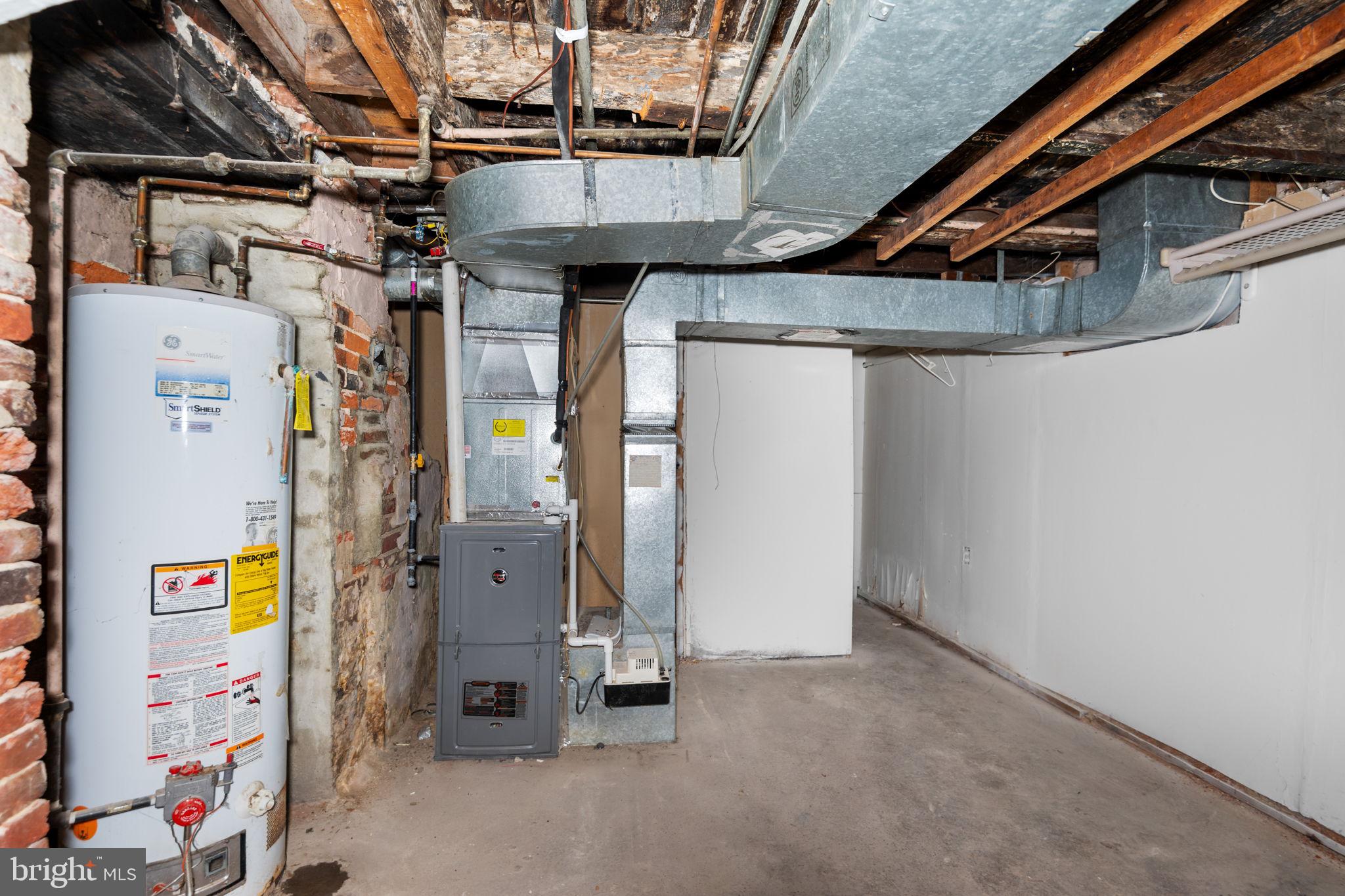 322 South Poppleton Street Baltimore, MD 21230 - Photo 27 of 34 Spacious basement with utility features.