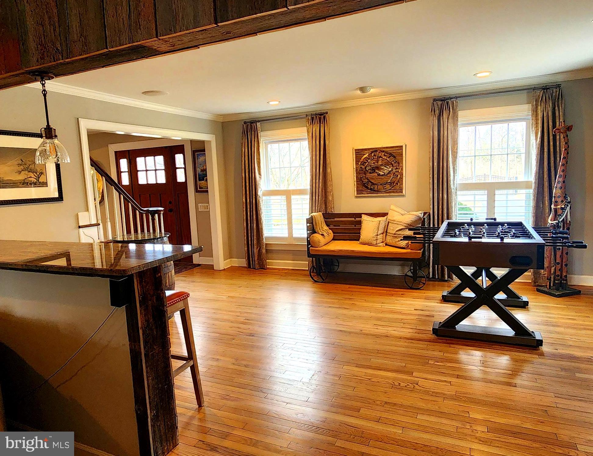 6774 Chapel Road New Hope, PA 18938 - Photo 18 of 59 a living room with furniture and a wooden floor