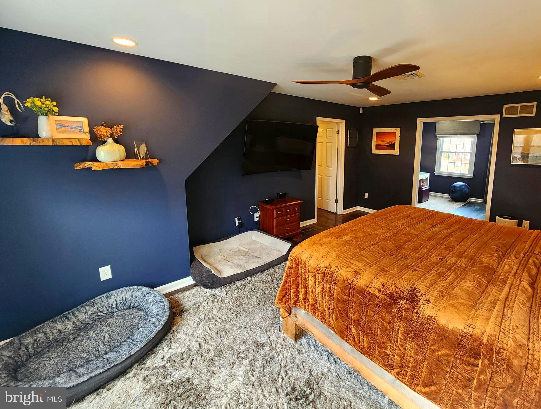 6774 Chapel Road New Hope, PA 18938 - Photo 24 of 59 a bed sitting in a bedroom and chair