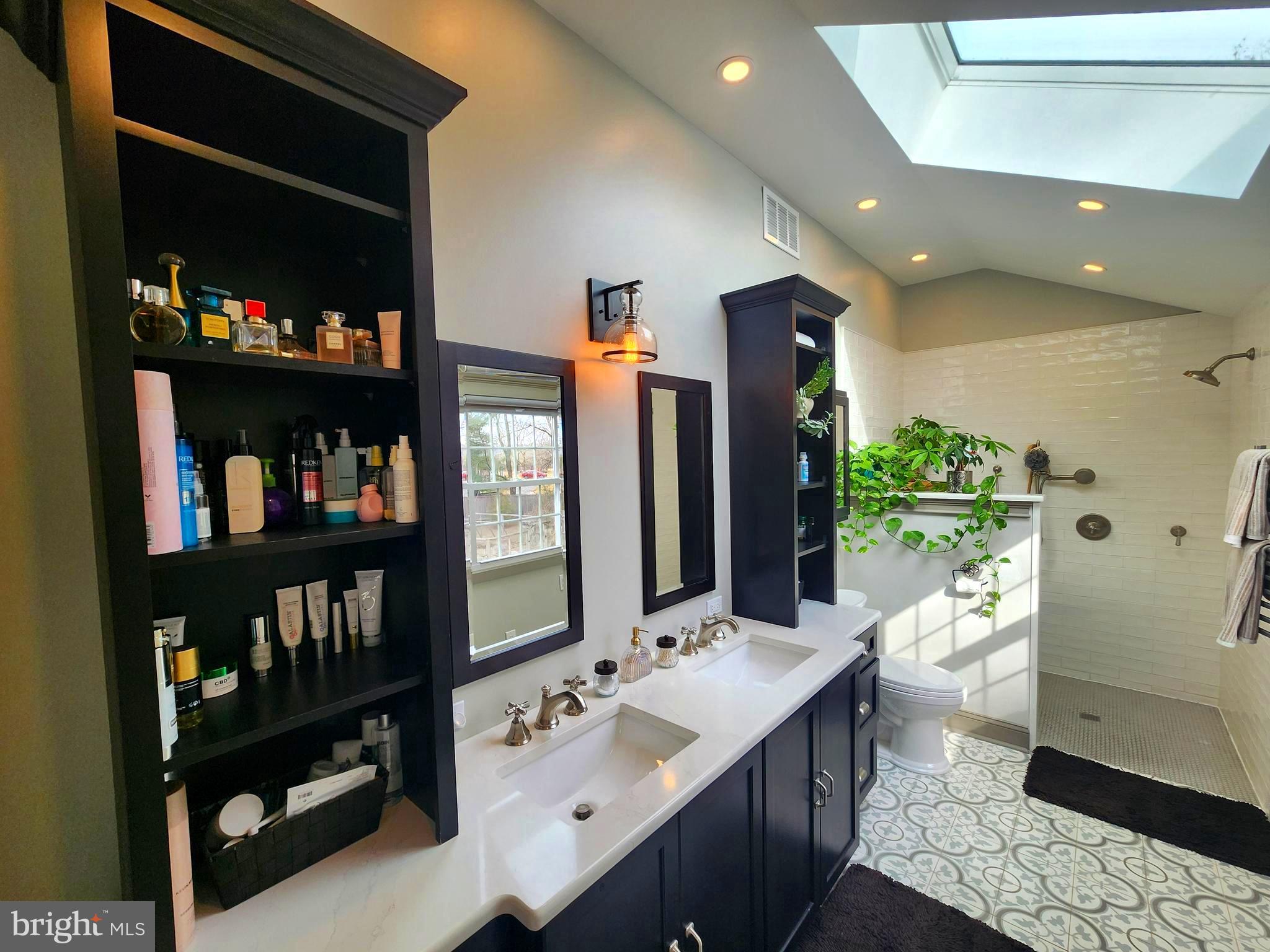6774 Chapel Road New Hope, PA 18938 - Photo 29 of 59 a bathroom with double vanity and a two mirror