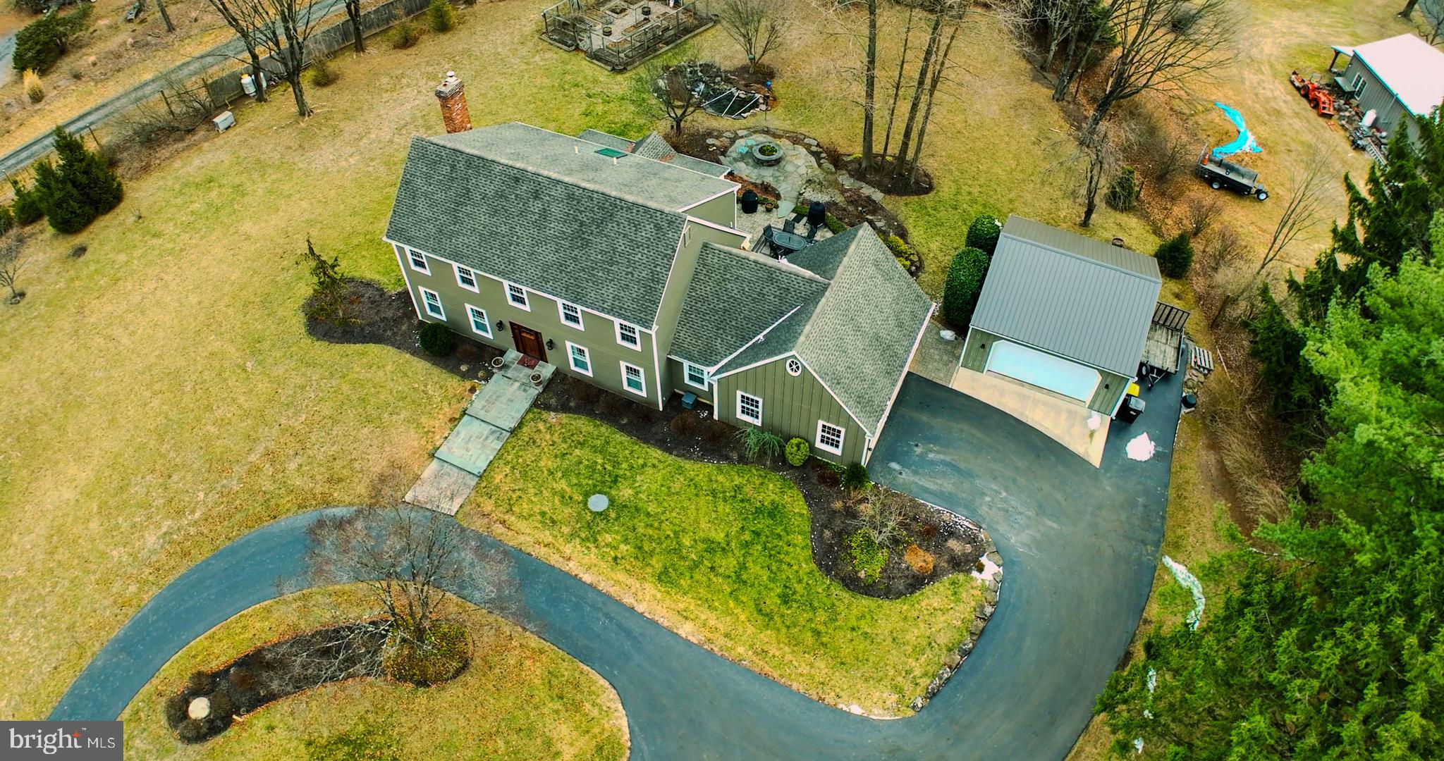 6774 Chapel Road New Hope, PA 18938 - Photo 50 of 59 an aerial view of a house with swimming pool