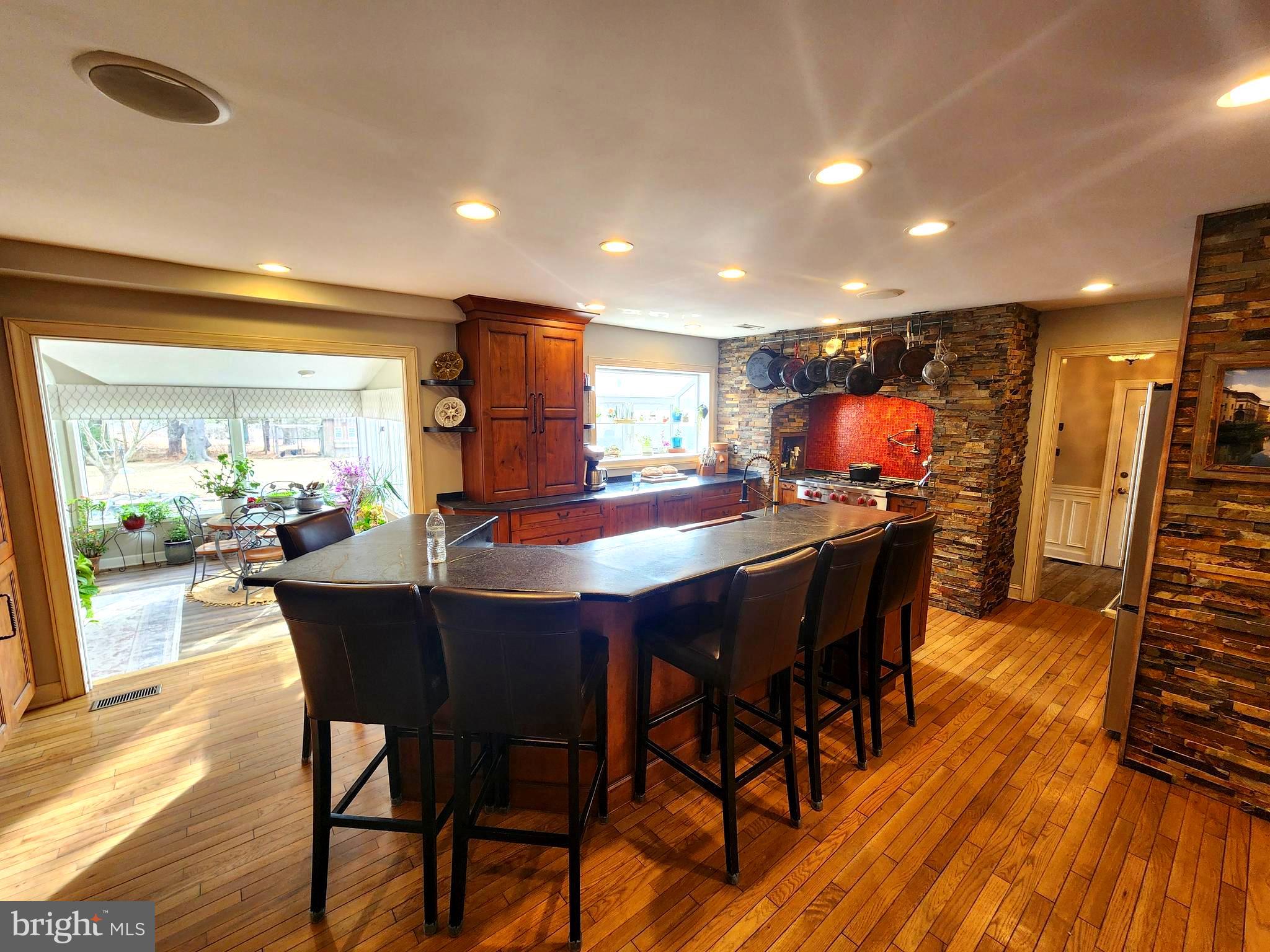 6774 Chapel Road New Hope, PA 18938 - Photo 6 of 59 a dining area with furniture and wooden floor