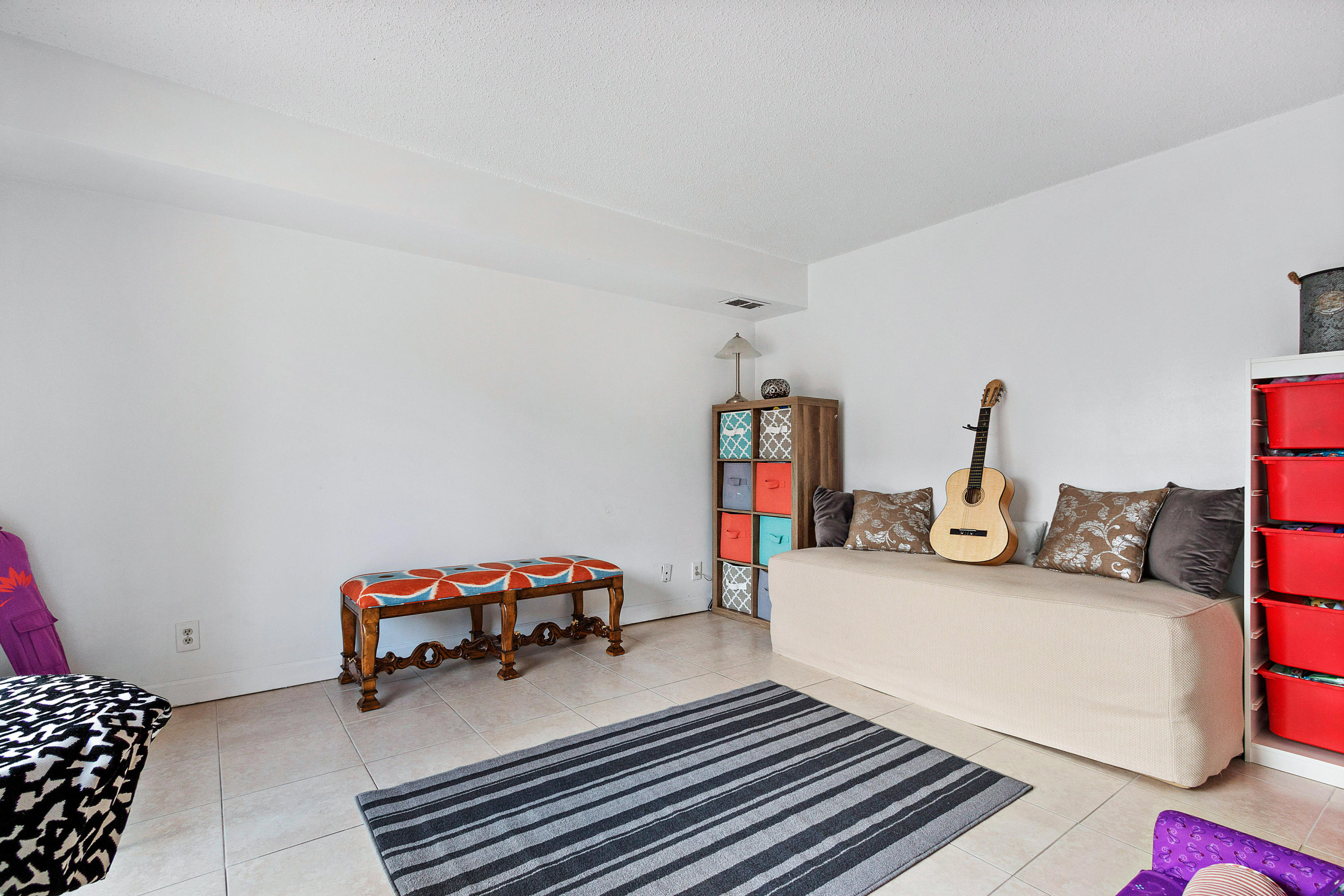 933 Springdale Circle Palm Springs, FL 33461 - Photo 6 of 22 Downstairs bedroom/office/den