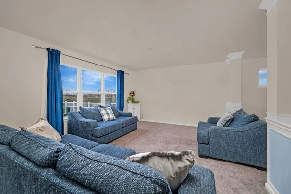 a living room with furniture and a couch