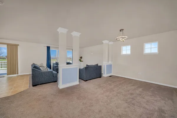 a living room with furniture and a couch