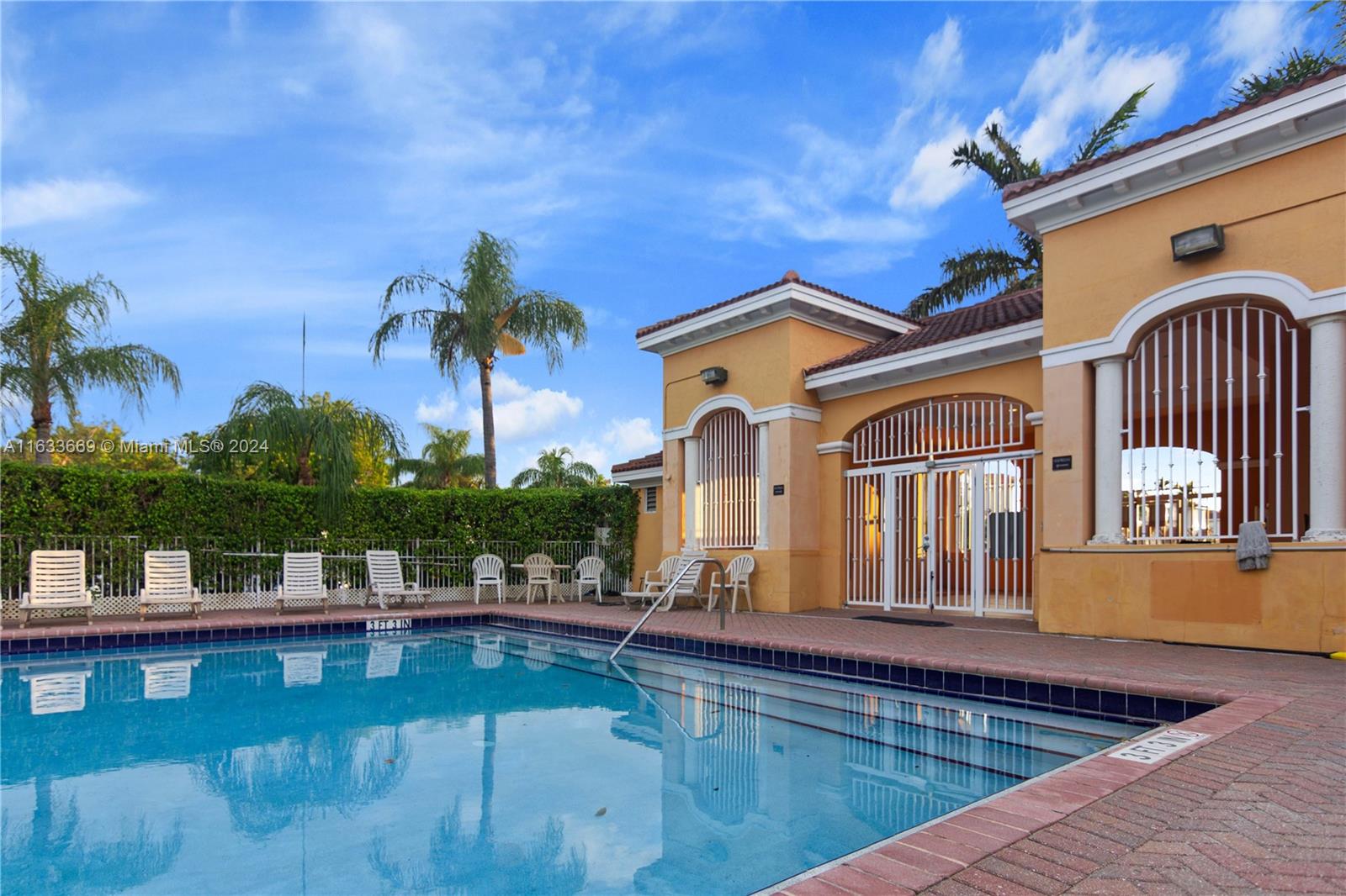 11051 Southwest 246th Street Homestead, FL 33032 - Photo 29 of 30 a view of a house with swimming pool