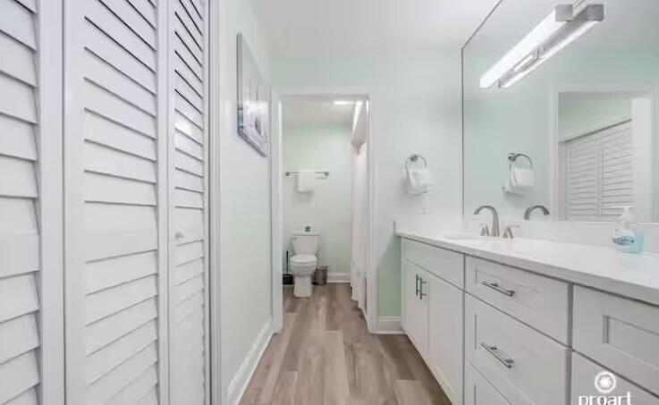 186 Durango Road Destin, FL 32541 - Photo 11 of 29 a spacious bathroom with a double vanity sink and a mirror