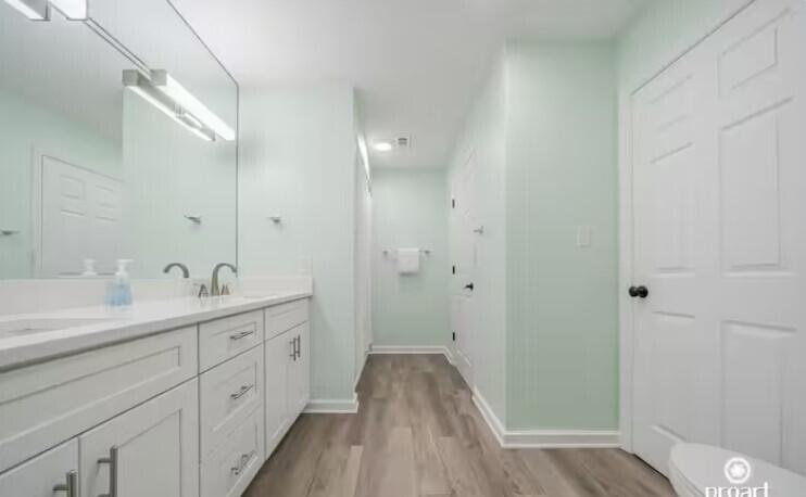 186 Durango Road Destin, FL 32541 - Photo 17 of 29 a spacious bathroom with a double vanity sink a mirror and a shower