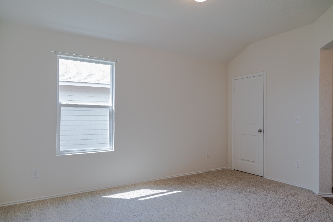 15225 Harkness Pass Austin, TX 78725 - Photo 15 of 23 an empty room with a window