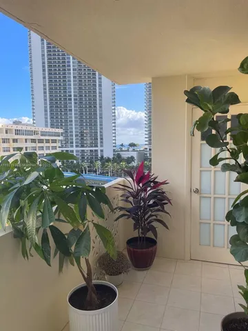 a view of a balcony with next to a window