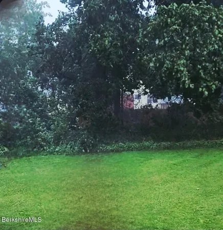 a view of outdoor space and yard