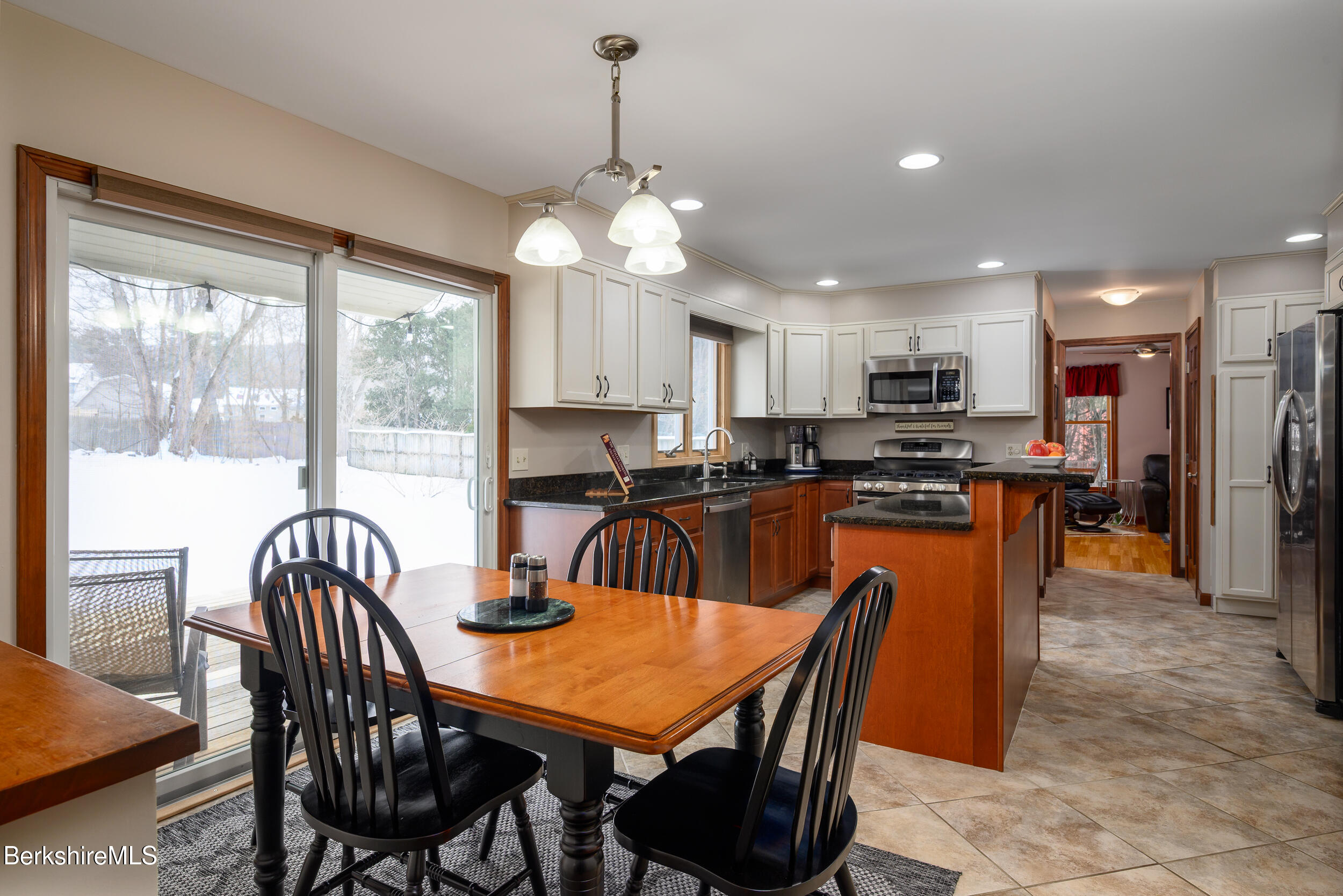 32 Marcella Way Dalton, MA 01226 - Photo 4 of 21 a view of a dining room with furniture window and outside view