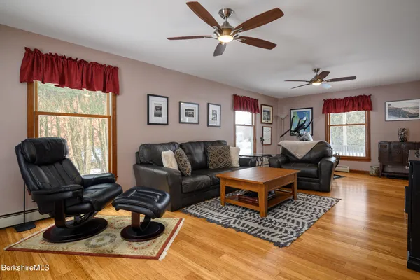 a living room with furniture or couch and a window