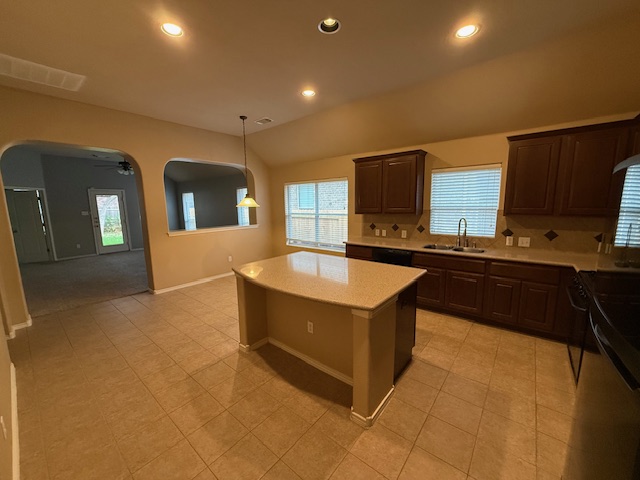 3717 Tall Cedars Road Cedar Park, TX 78613 - Photo 5 of 22 a kitchen with stainless steel appliances granite countertop a sink and a stove