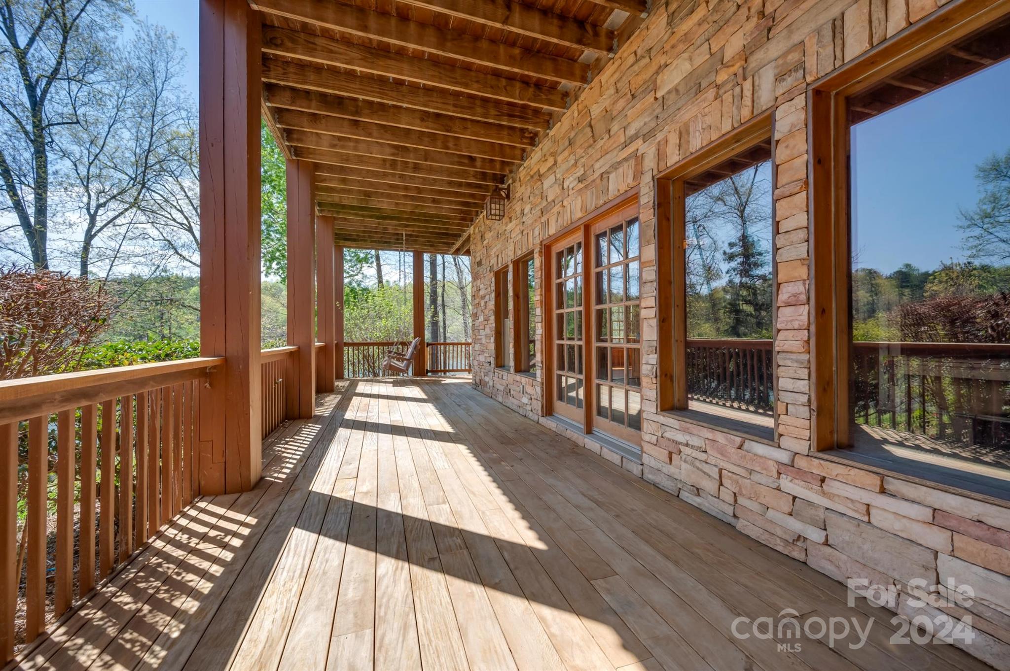 778 Pkwy N Road Mill Spring, NC 28756 - Photo 14 of 48 a view of balcony with wooden floor