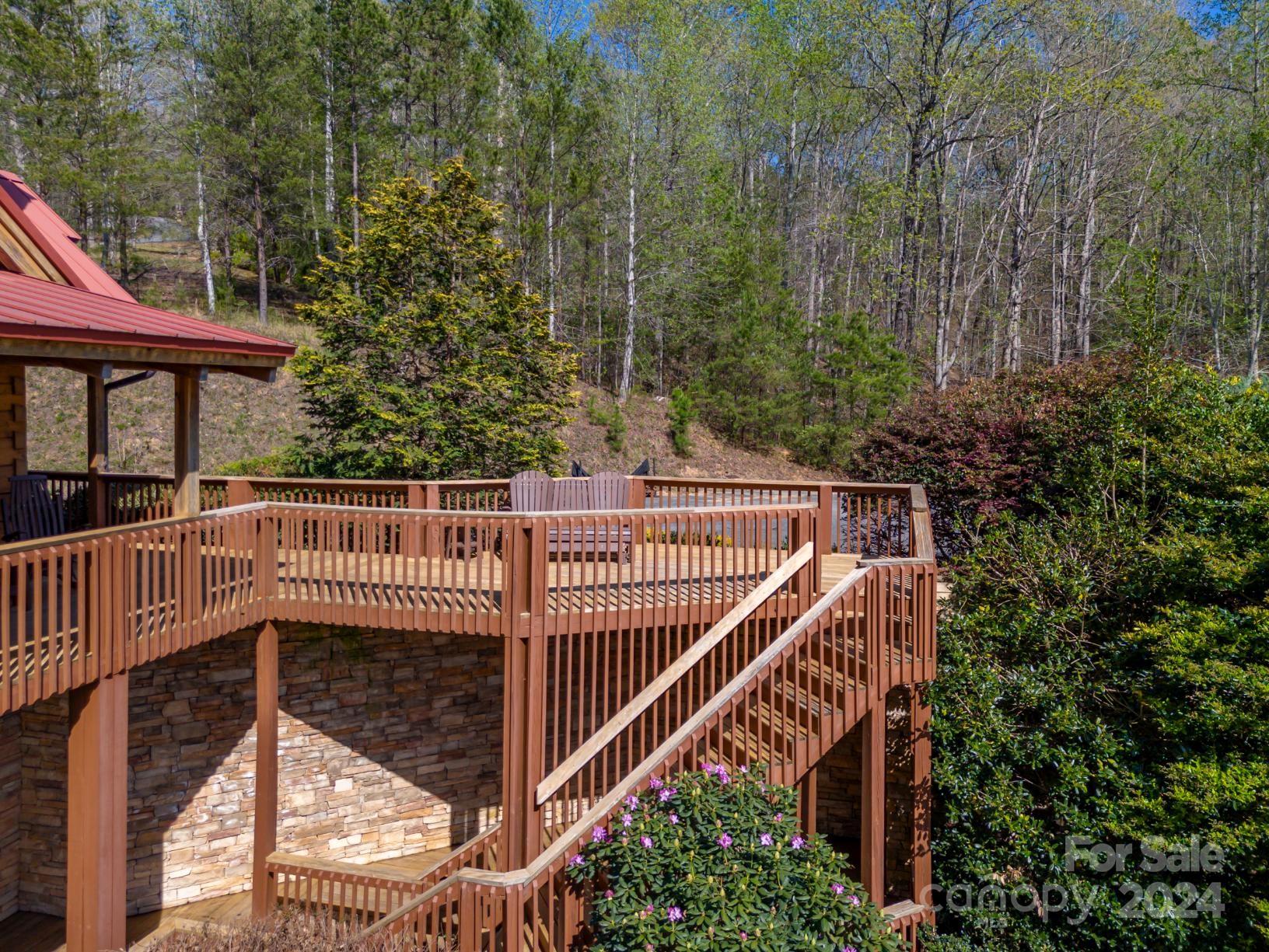 778 Pkwy N Road Mill Spring, NC 28756 - Photo 16 of 48 a view of balcony with wooden floor and fence