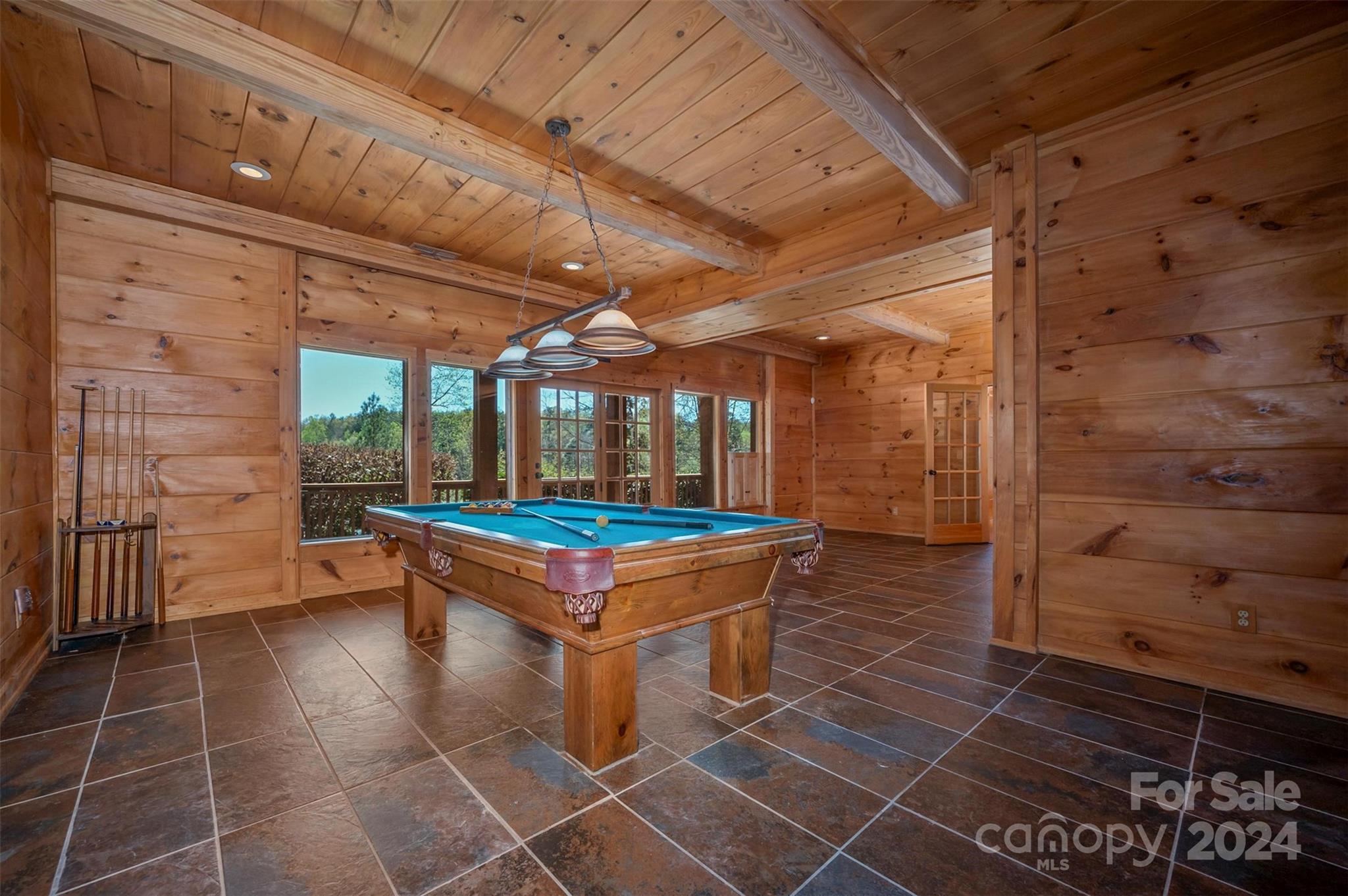 778 Pkwy N Road Mill Spring, NC 28756 - Photo 48 of 48 a room with pool table and glass windows