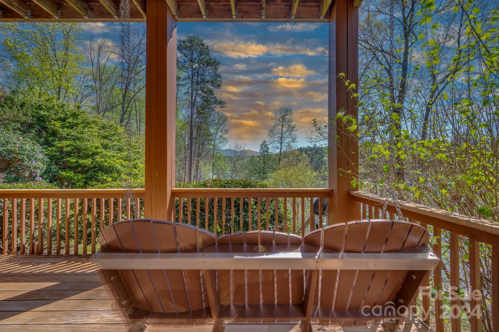 778 Pkwy N Road Mill Spring, NC 28756 - Photo 6 of 48 a view of balcony with wooden floor