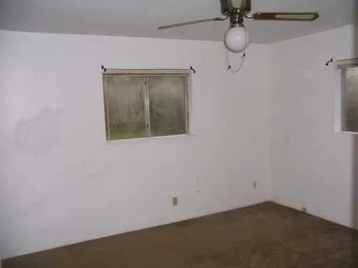 a view of a small space with a fan