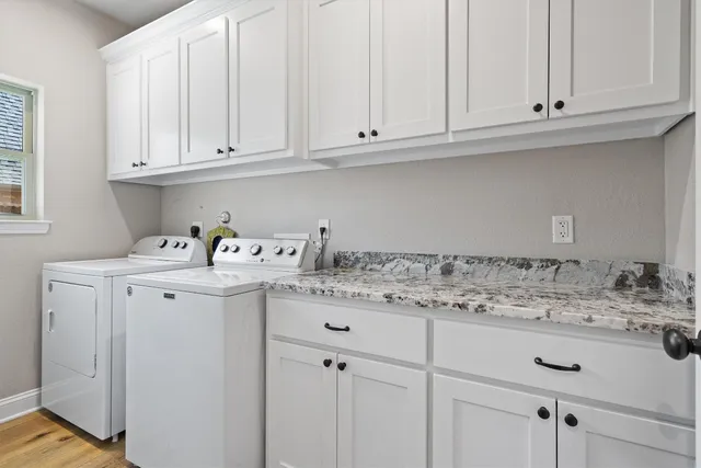 a view of cabinets with sink