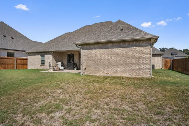 a front view of house with yard