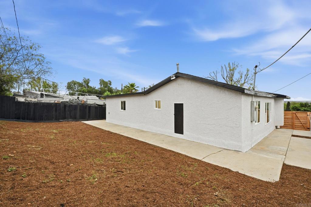 1333 Helix Street Spring Valley, CA 91977 - Photo 42 of 45 a view of a house with a backyard