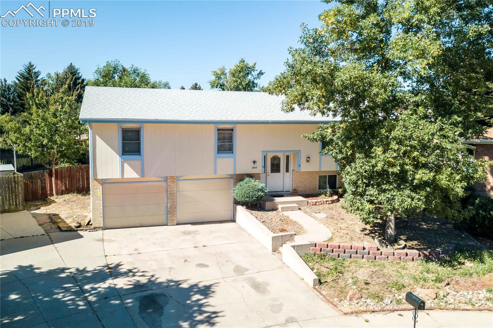 2803 Ridgeglen Place Colorado Springs, CO 80918 - Photo 1 of 2 Bi-level home in cul-de-sac with mature trees