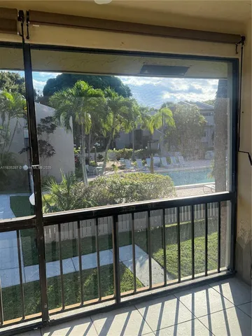 a view of a glass door with a glass door