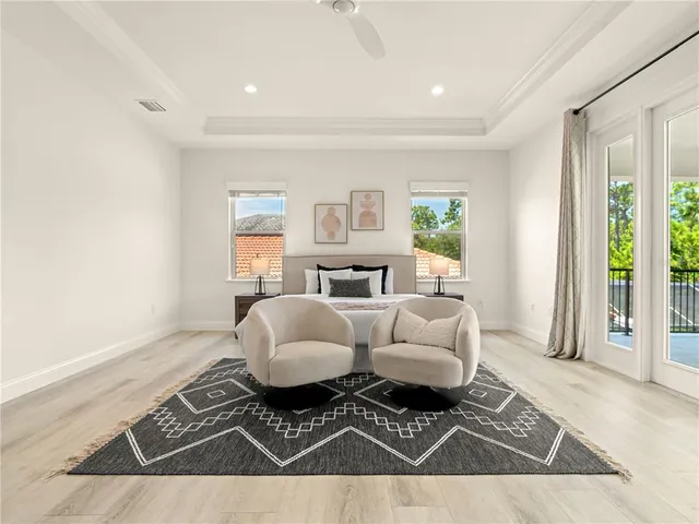a living room with furniture rug and window